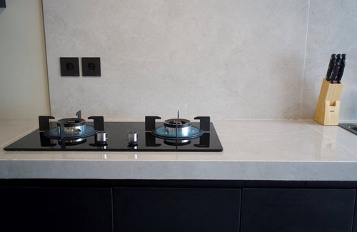 Babakan Villa | Wolu Villa Loft , Experience the allure of expansive floor-to-ceiling windows,