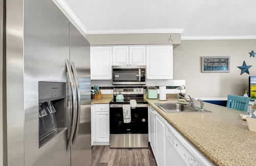 Whitney Beach Condo | Wonderful Canal Front Condo! Bring Your Boat!UNIT 11