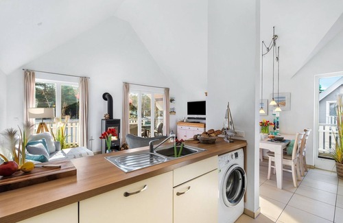 Glowe House | Wonderful vacation apartment with infrared sauna, wood-burning stove and sunny balcony -