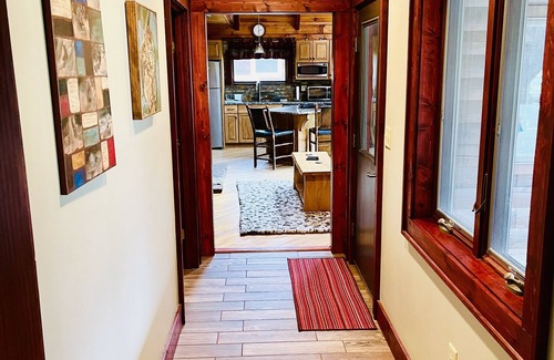 Champion House | Wooded cabin in the Laurel Highlands with beautiful yard and native trout stream