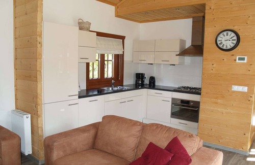 Lochem Ski Chalet | Wooden chalet in a holiday park in the Achterhoek