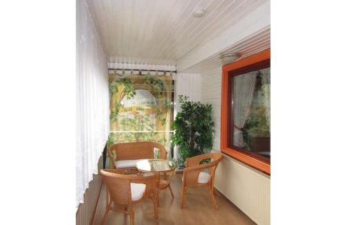 Waldsiedlung Romerstraße House | Wooden holiday home with winter garden