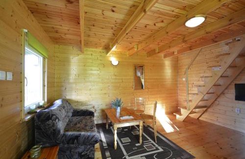 Miedzyzdroje House | Wooden House in Lubin by Lake Wicko