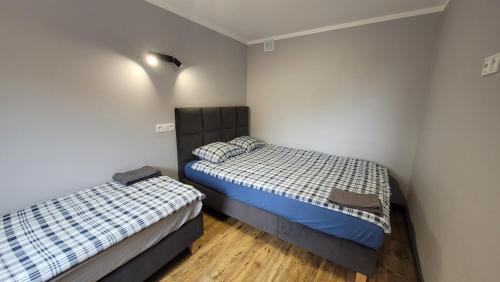 Checiny Apartment | Wrzosowe Wzgórze 5 - Apartament 2 sypialnie