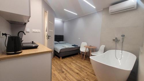 Checiny Apartment | Wrzosowe Wzgórze 5 - Studia i Apartamenty