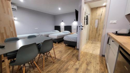Checiny Apartment | Wrzosowe Wzgórze 5 - Studia i Apartamenty
