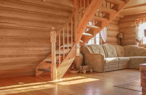 Darlowo House | Year-round habitable wooden house with thatched roof.