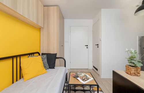Brynow Apartment | Yellow and Grey Studio by Renters