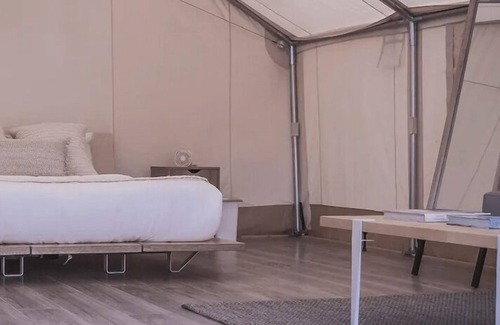 Island Park RV Rental | Yellowstone canvas tent w/ king bed & sleeper sofa