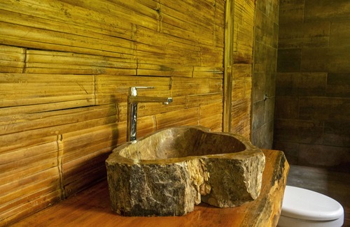 Ballena Cabin | Yogachal Vista Mar bamboo cabiña in jungle w waterfall and seaview yoga deck