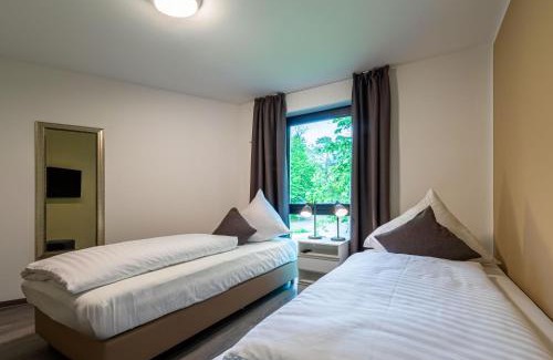 Krakow am See Apartment | Yogasutra - Stilvolles 3-Zimmer-Apartment mit Seeblick, Balkon & Sauna