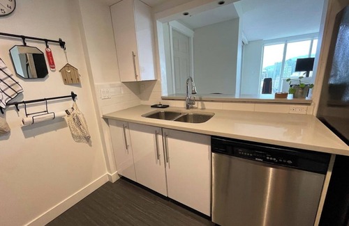 Crosstown Condo | You're in the heart of the action for entertainment and office!