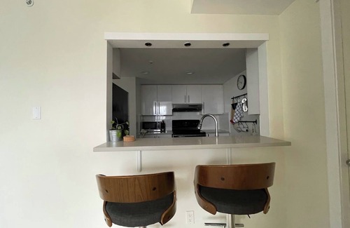 Crosstown Condo | You're in the heart of the action for entertainment and office!