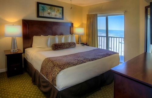 Treasure Island Hotel | Your Home Away From Home! Balcony, Kitchen, 2 Pools, Free Parking