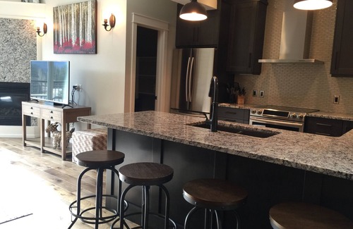 Canmore Condo | Your Penthouse with a private rooftop new hot tub.