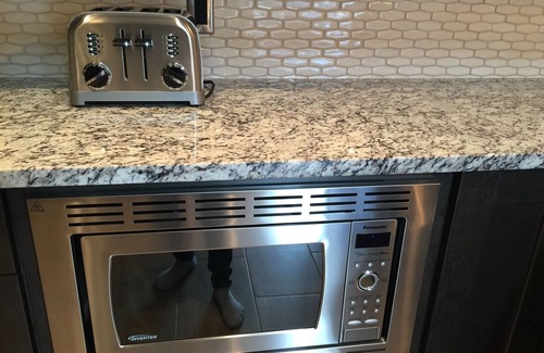 Canmore Condo | Your Penthouse with a private rooftop new hot tub.