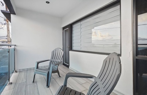 Arecibo Pueblo House | Zaturn Beach House – Oceanfront villa w/rooftop terrace & jacuzzi