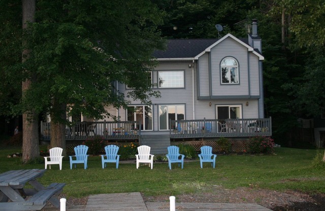 1 acre of level property, 339' of private waterfront and easy beach level access