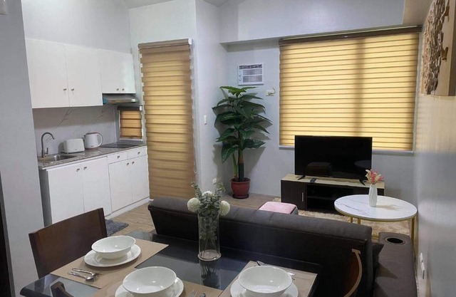 1 bedroom condo unit with balcony, netflix wifi and pool