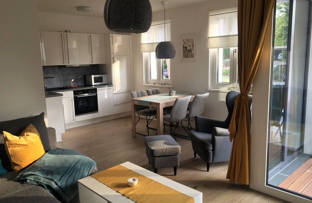 1 minute to the fine sandy beach - Beautiful modern apartment with sauna