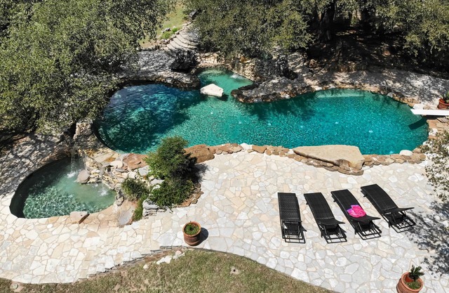 10,000 Sq.Ft Lux Estate on 650 Acres with Amazing Pool, Spa & Hill Country Views