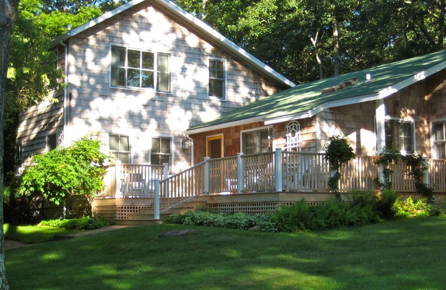 1137 SPRINGS FIREPLACE RD- Charming Cottage with Glorious Sun Room by the Bay