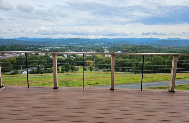 180-degree panoramic views of Vermont's mountains from the living room and Deck