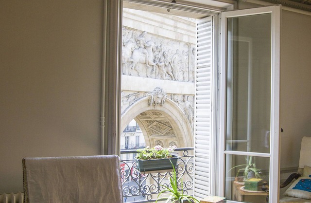 19th Century Haussmannian apartment with view of Louis XIV gate to Paris