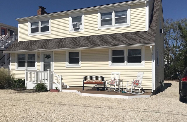 1st Fl of duplex. Sunsets over the bay, walk to beach. Great family getaway.