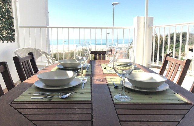 1st line beach, large terrace facing the sea, free WIFI