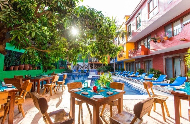 2 Deluxe 2BR Suites only 2' Walk from the Beach