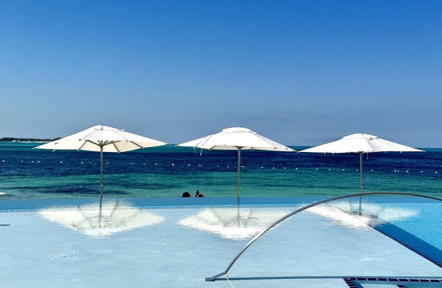 30 day rental, corner unit, water & golf course views, resort beach and pool