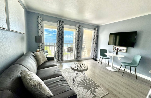311 · Sophisticated Waterfront Getaway: Pool, Balcony, and Serene Views