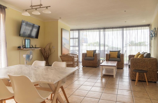 350 metre from beach. 2-bedroom, 2-bathroom ground floor apt with patio & braai