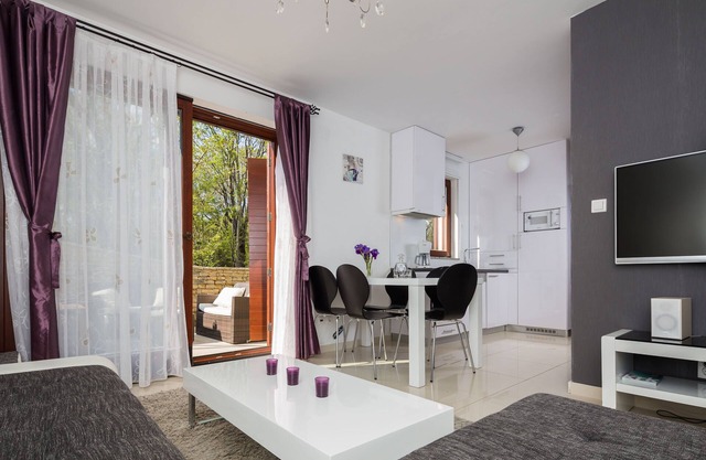 4 star romantic villa, just a minute walk to the beach, heated pool.