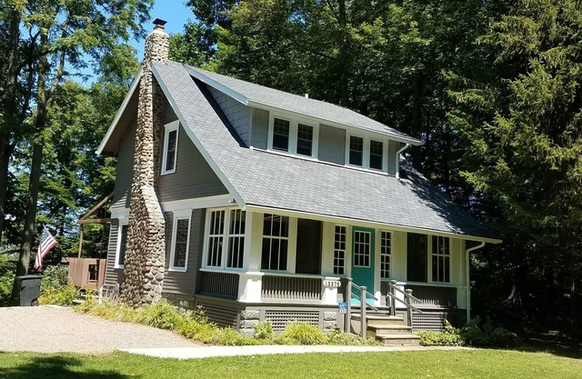 5 lakefront acres with DIRECT beach access from property