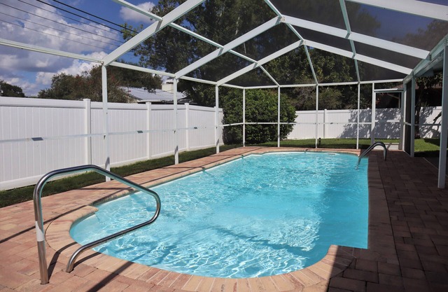 5 miles to Clearwater Beach Fun! Spacious Pool Home w/Yard!