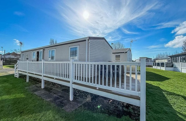 8 berth caravan with decking to hire at Naze Marine in Essex ref 17045NM