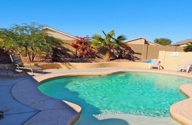 800 SQ FT PUTTING/CHIPPING GREEN NEXT TO HEATED POOL 4 BD RM HOME