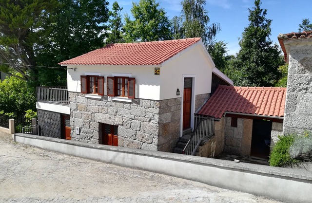 A cozy rustic house with essential services 25 meters away.