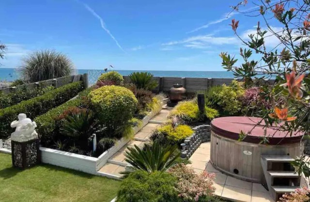 Absolute Beachfront Oasis with Sea Views & Hot Tub