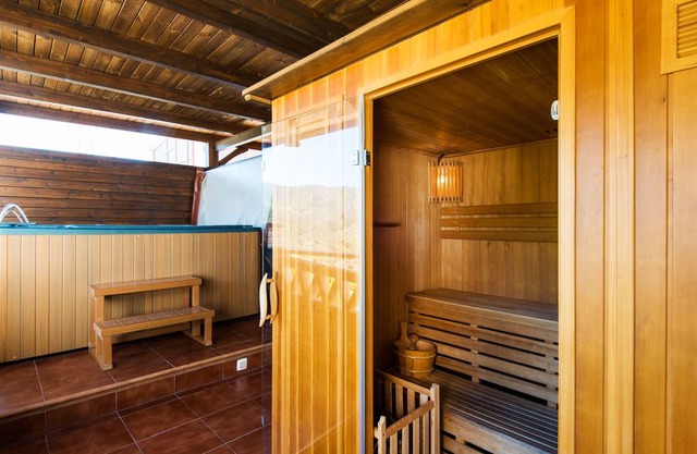 Air-Conditioned Apartment in the Mountains with Terrace, Mountain Views, Optional Sauna & Whirlpool; Parking Available, Free Wi-Fi