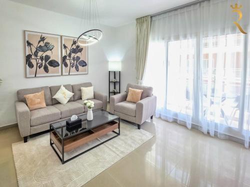 Al Reef Grace 1BR - Stylish Stay with Balcony, Dining & Kitchen Near Al Reef Beac