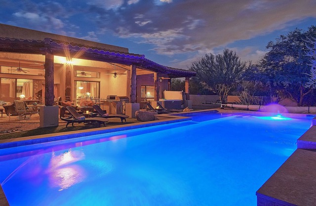 AMAZING DESERT OASIS +FILLED WITH AMENITIES + HEATED POOL + 2 HOT TUBS +12 BEDS