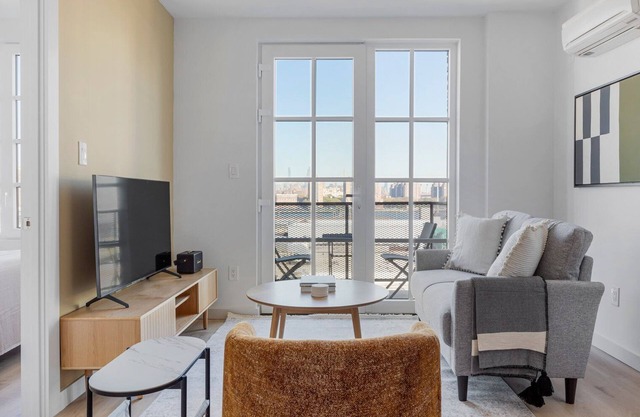 Amazing Dumbo 2BR w/W/D, Roof & Gym, nr TimeOut Building, by Blueground