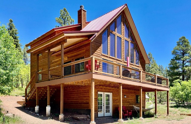 Amazing lake view home with fireplace, W/D, kitchen, grill, balcony, and deck