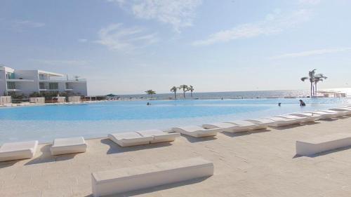 Amazing &Totally New! Aria Ocean Condo 306 by Kivoya