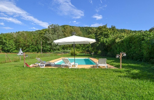 An original cottage in an old mill with large fenced garden and private pool.