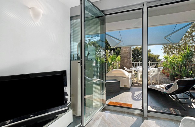 Apartment 'Casa Simona' with Sea View, Shared Pool and Private Terrace