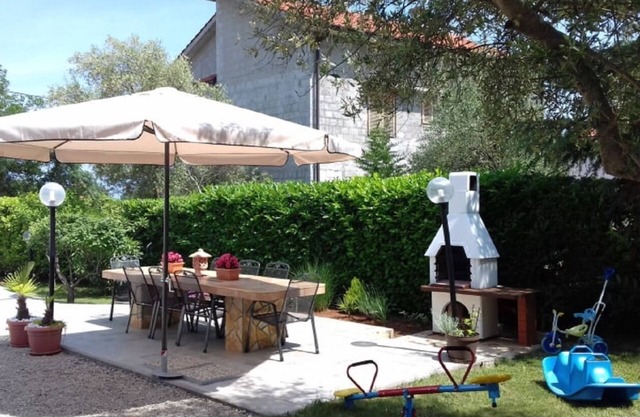 Apartment Dragica - with kids playground: A1 MIA(2+1) - Malinska, Island Krk, Croatia